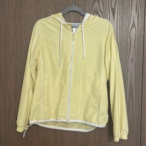 Pale yellow vintage Reebok raincoat.
